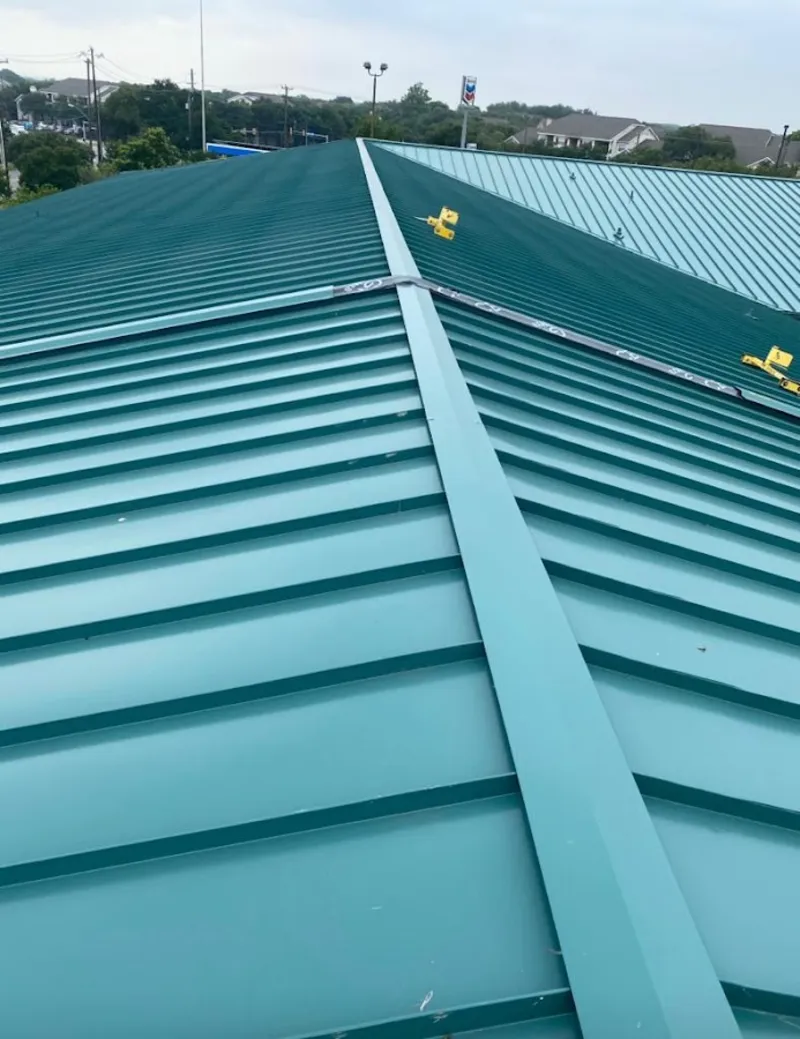 Green commercial metal roof ridge and valley for Metal Roof Repair in East Ridge