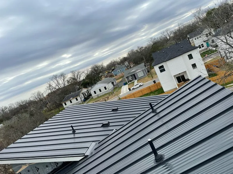 Standing seam metal roof panels with vents for Skylight Repair in East Ridge